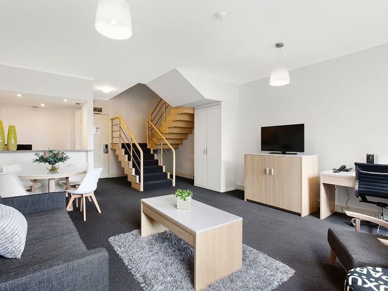 Luxury living area with amenities in Mercure Loft Suite at Pullman Albert Park