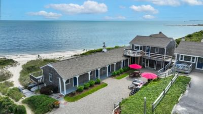 Aerial view of the resort with patio outdoors by the sea at Chatham Tides Resort