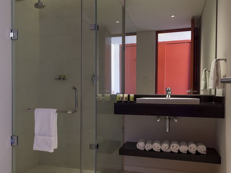 Superior Room shower cubicle & wash basin at Gamma Hotels