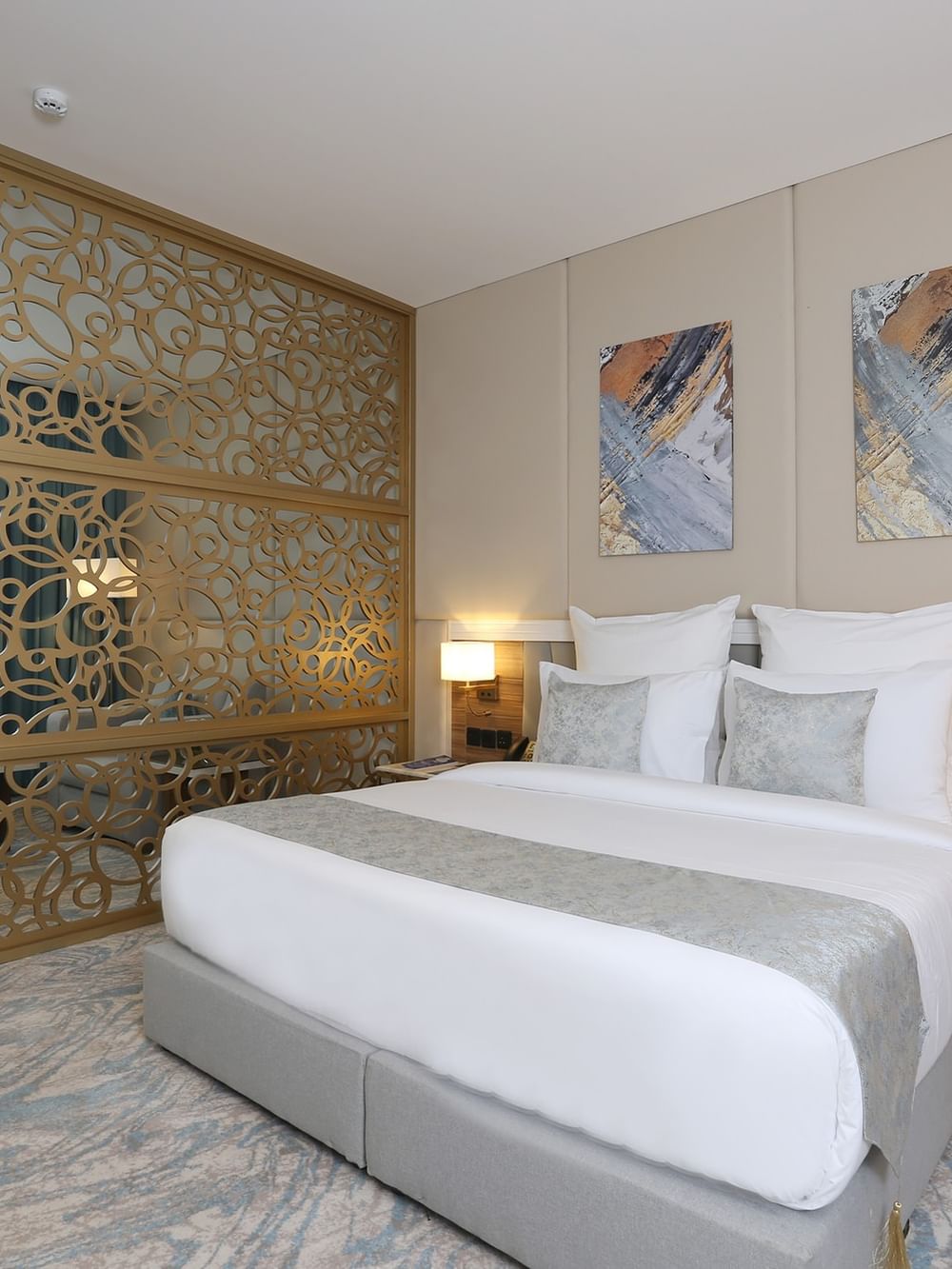 Elegantly decorated Junior Suite at Cantonal Hotel by Warwick Riyadh.