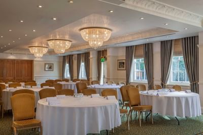 Interior view of Gold Room with tables set for an event at Orsett Hall Hotel
