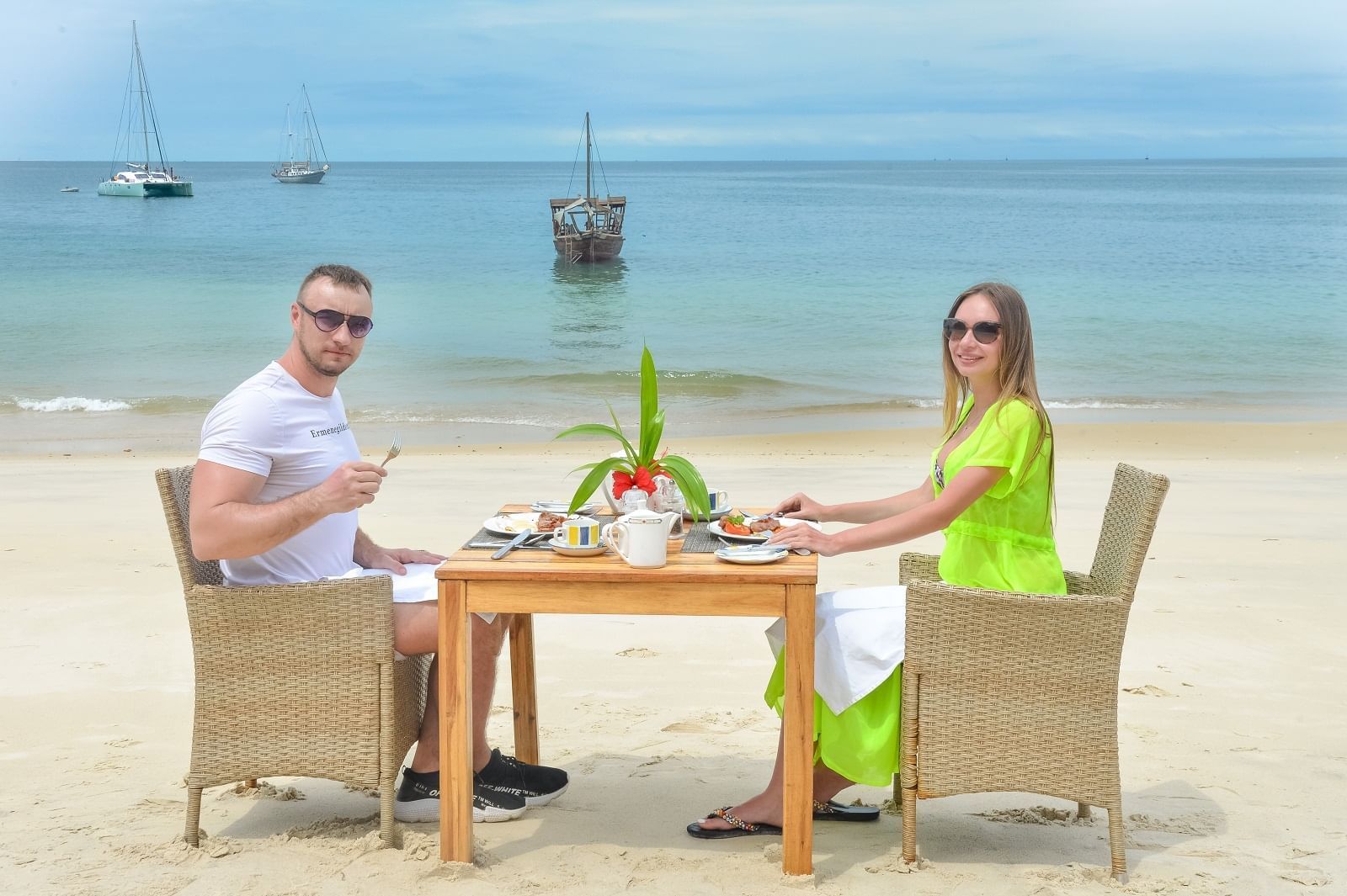A couple having lunch by the sea at Zanzibar Serena Hotel