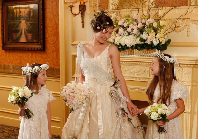 Bride with 2 flower girls at Peabody Memphis