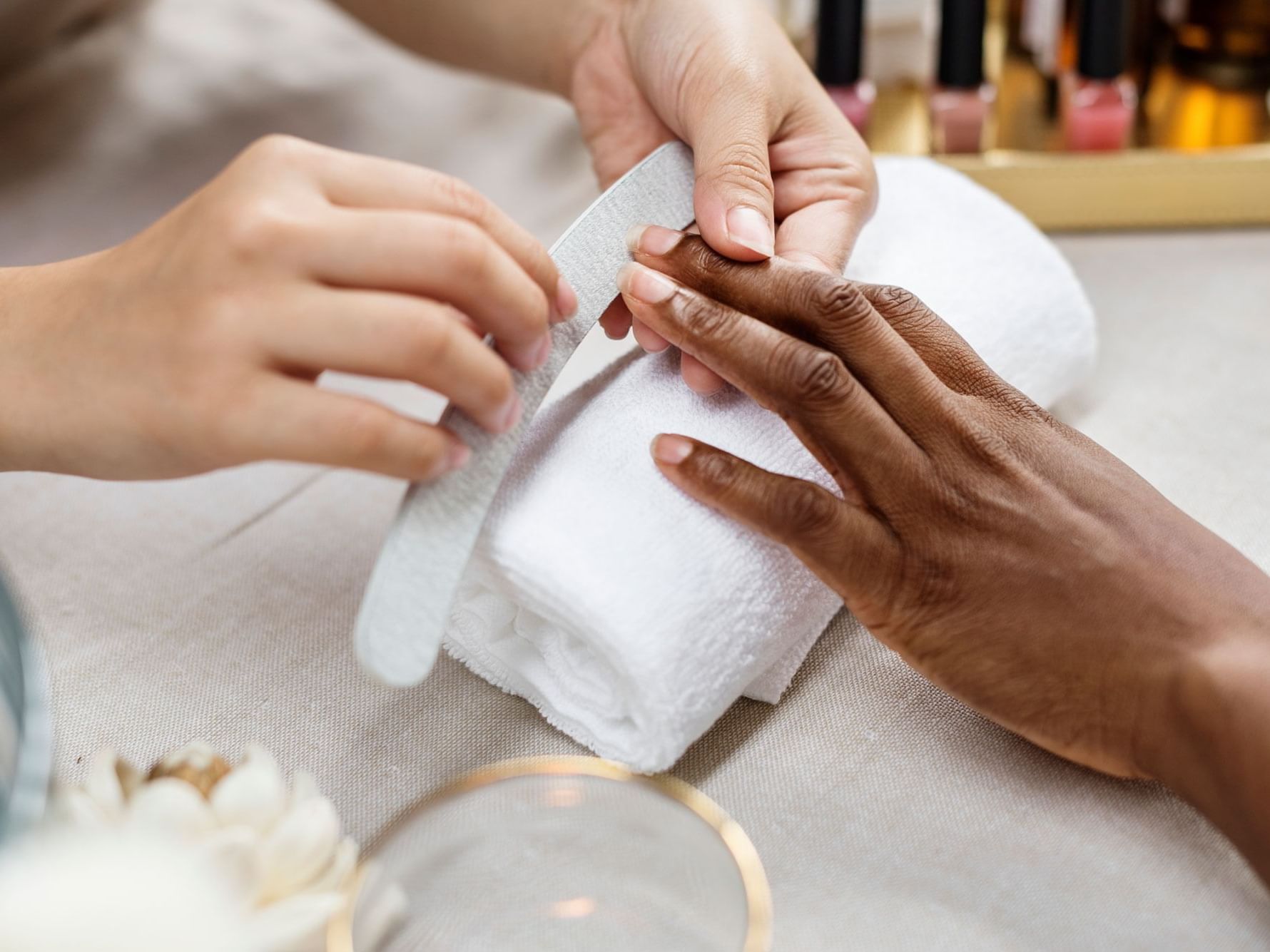A woman getting a manicure in the Spa at High Peaks Resort