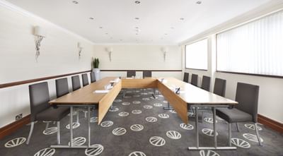 Craigton Suite with a U-shaped table set up for a meeting at The Aberdeen Altens Hotel