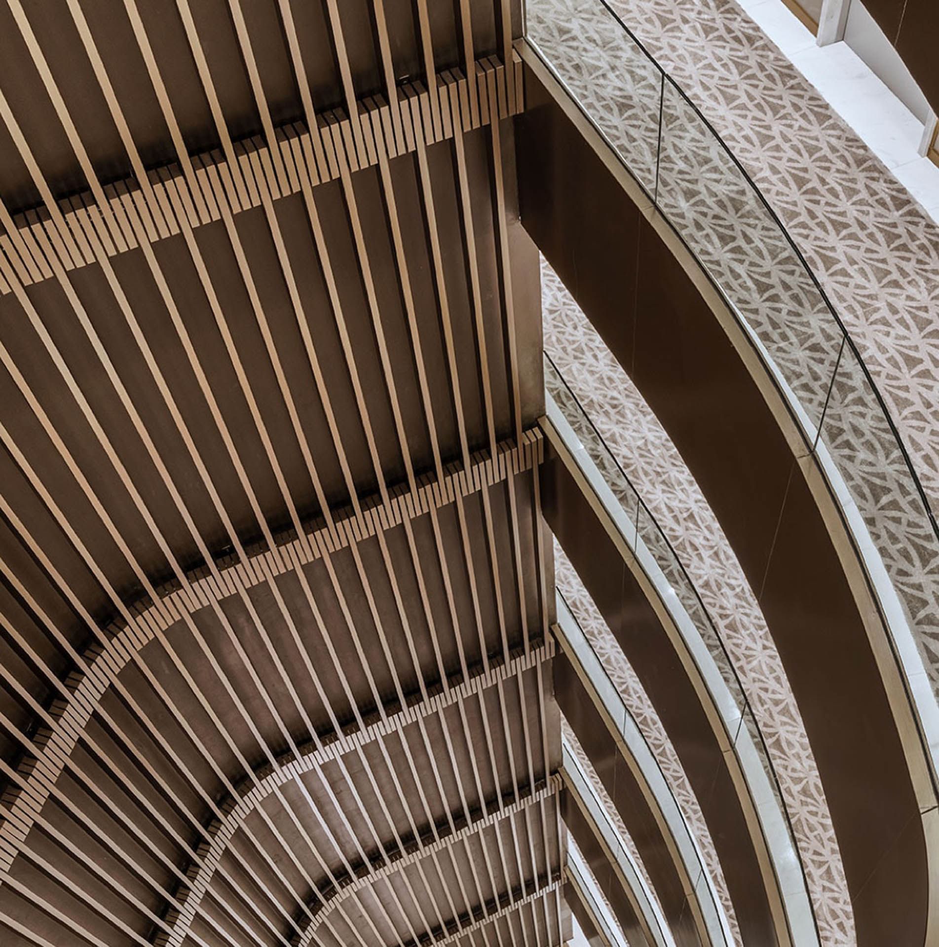 Lobby atrium staircase at Almanac Barcelona