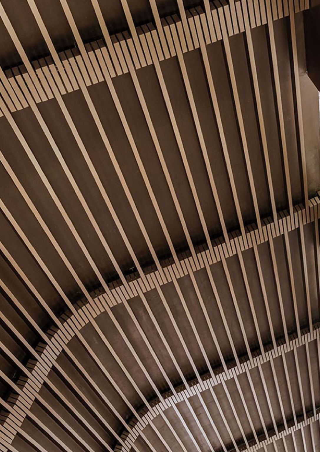 Lobby atrium staircase at Almanac Barcelona