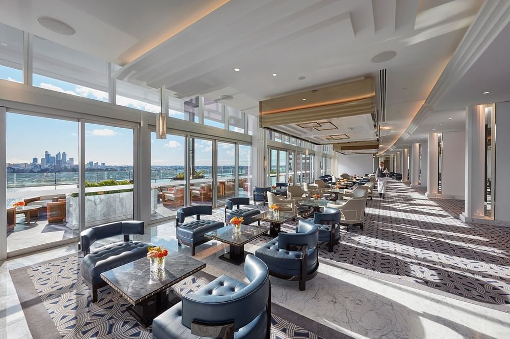 Interior of a Lobby area with a city view at Crown Hotel Perth