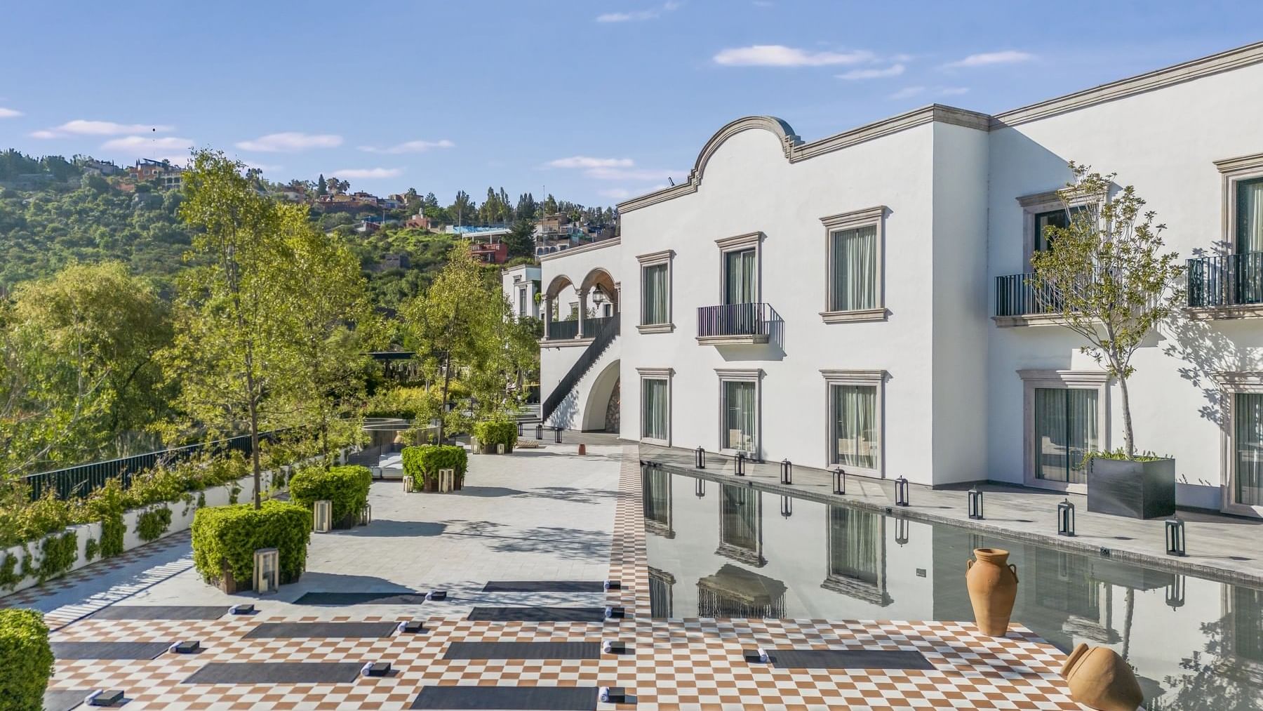 Exterior view of Live Aqua San Miguel de Allende with dining and pool area