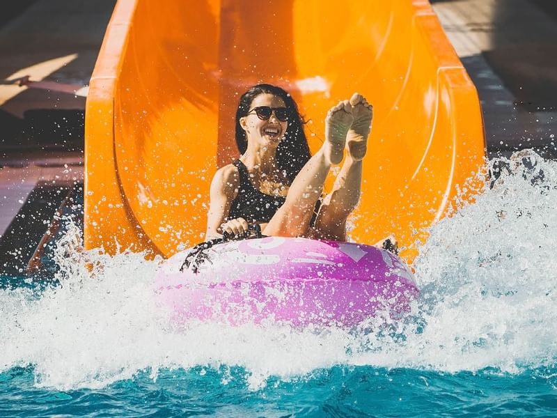 A lady enjoying water slide near Fiesta Americana