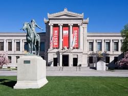 a statue in front of the Museum of Fine Arts