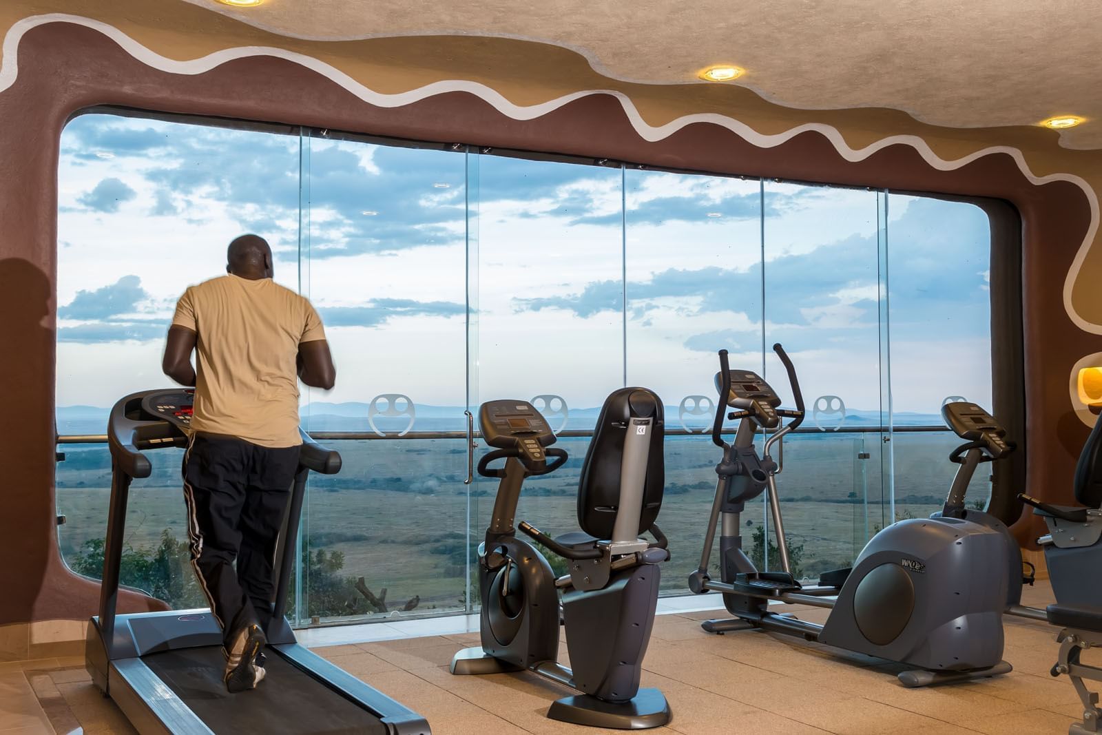 A fitness center with treadmills at Mara Serena Safari Lodge