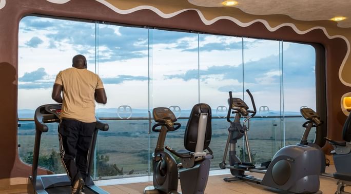 A fitness center with treadmills at Mara Serena Safari Lodge