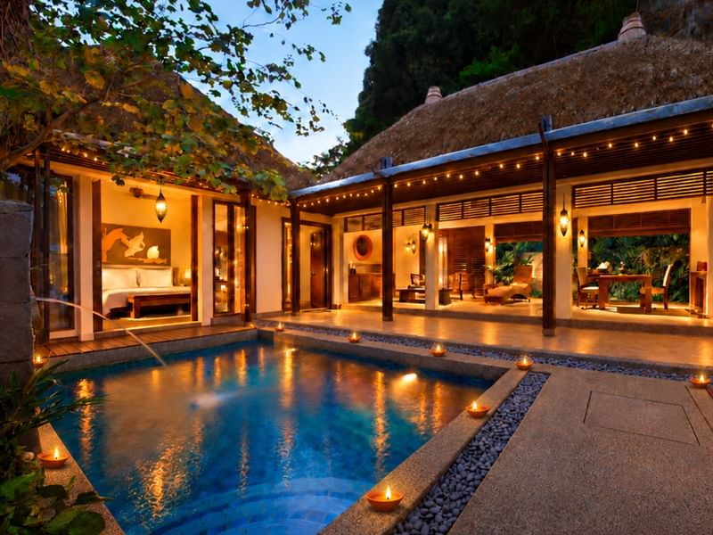 Deepavali Celebration Escape features a thatched-roof villa with glowing pool, string lights, and complimentary high tea at the banjaran hotsprings retreat.