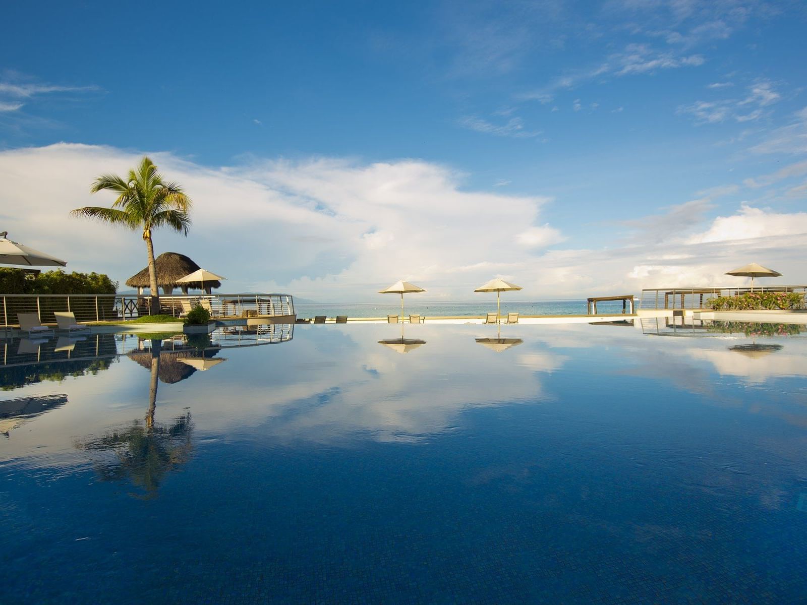 Infinity Pool with Beach in the Background