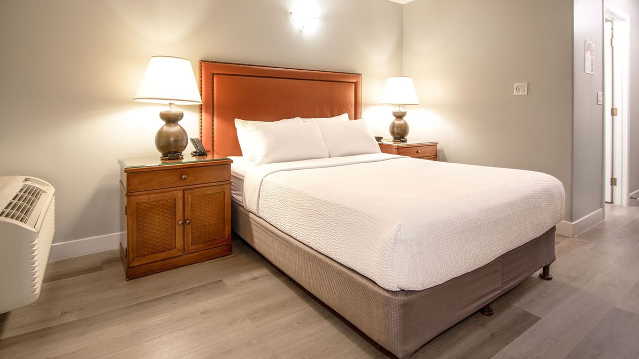 Hotel guestroom with queen bed