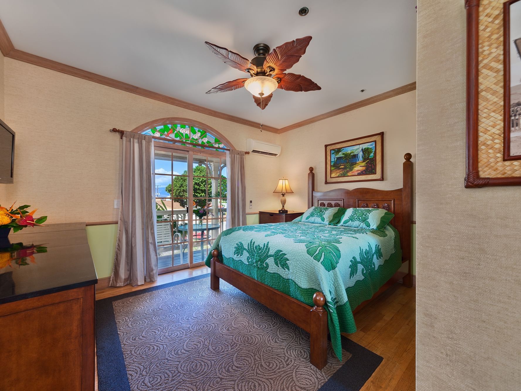 green bed in tropical room