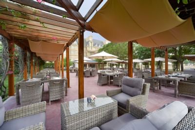 chairs at patio cafè at Al Aziziyah Boutique Hotel
