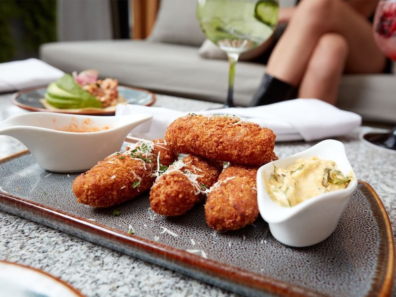 Crispy breaded chicken fingers served at Fiesta Americana