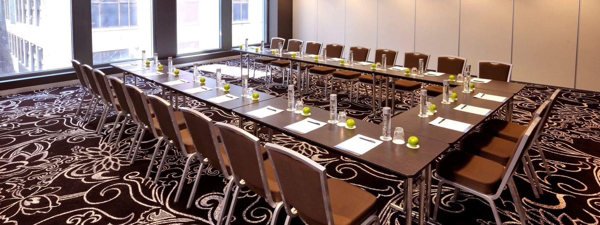 U-shaped table setup for a meeting at Novotel Melbourn
