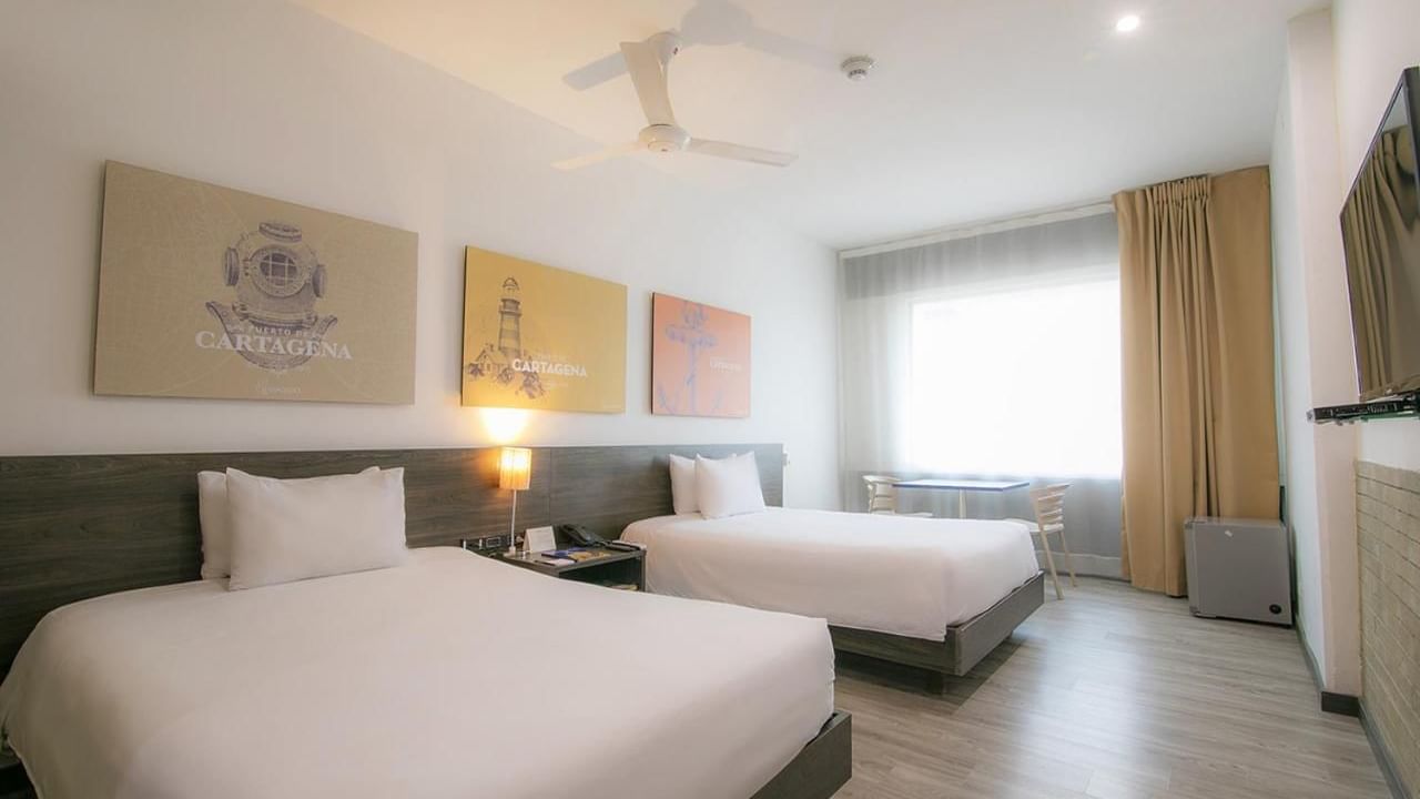 Spacious bedroom with two beds in Pop Twin room at DOT Hotels