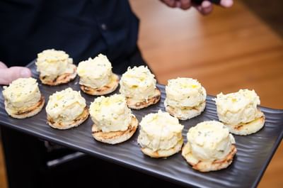 Close-up of a platter of egg salad sandwiches served at The Stanley Hotel