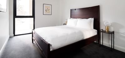 King bed in One-Bedroom Deluxe Apartment at Knightsbridge