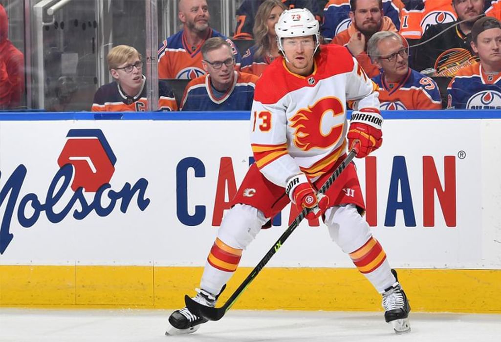 player for calgary flames gets ready for puck