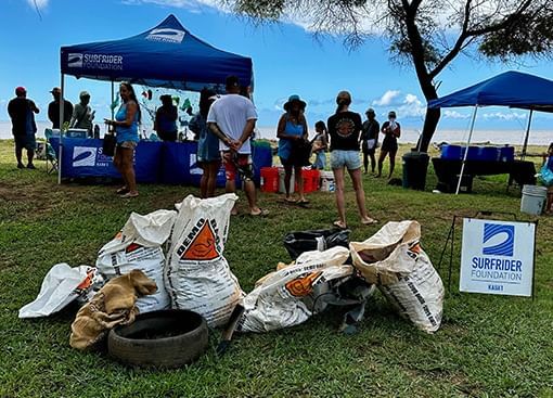 Volunteers gather after the beach cleanup