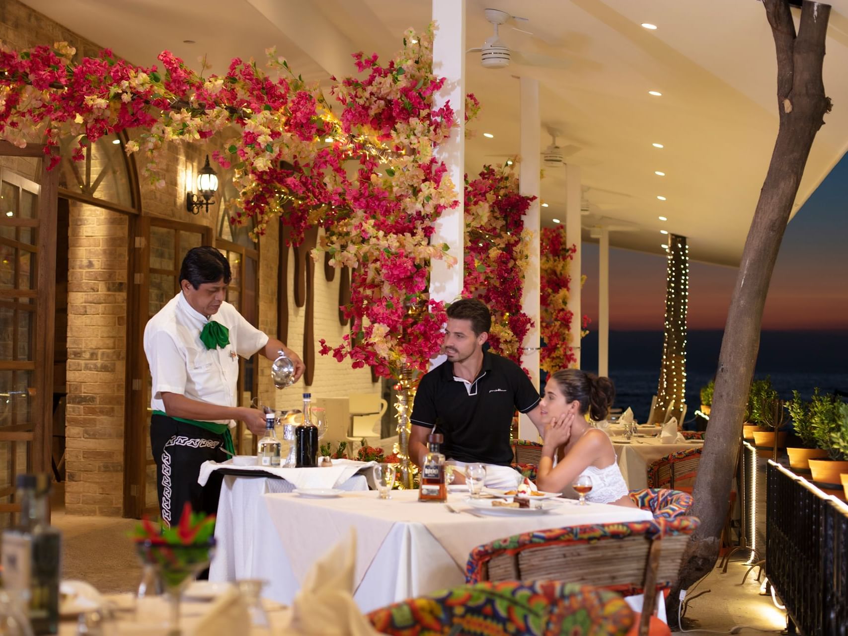 Couple dining in El Agave Restaurant at Casa Dona Susana