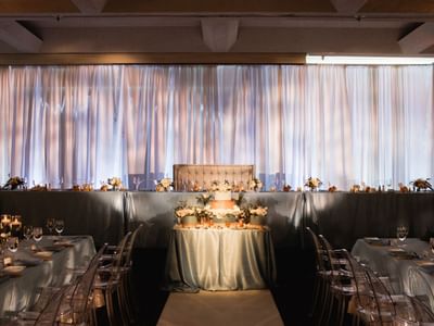 Wedding reception with tables & chairs at Carriage House Hotel