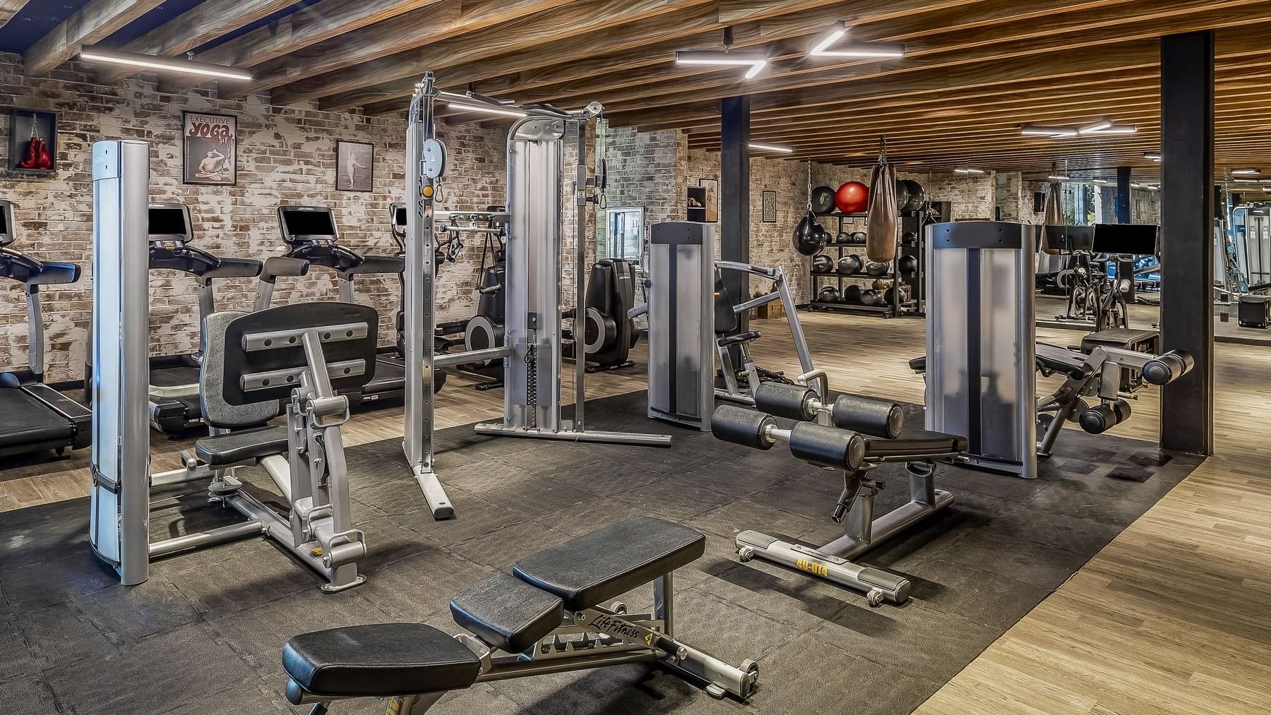 Well-equipped modern fitness center at Live Aqua San Miguel de Allende