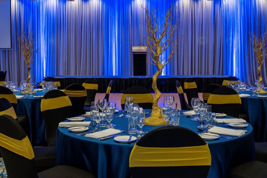 Banquets set-up in a Meeting Room adorned with blue lighting at Hotel Grand Chancellor