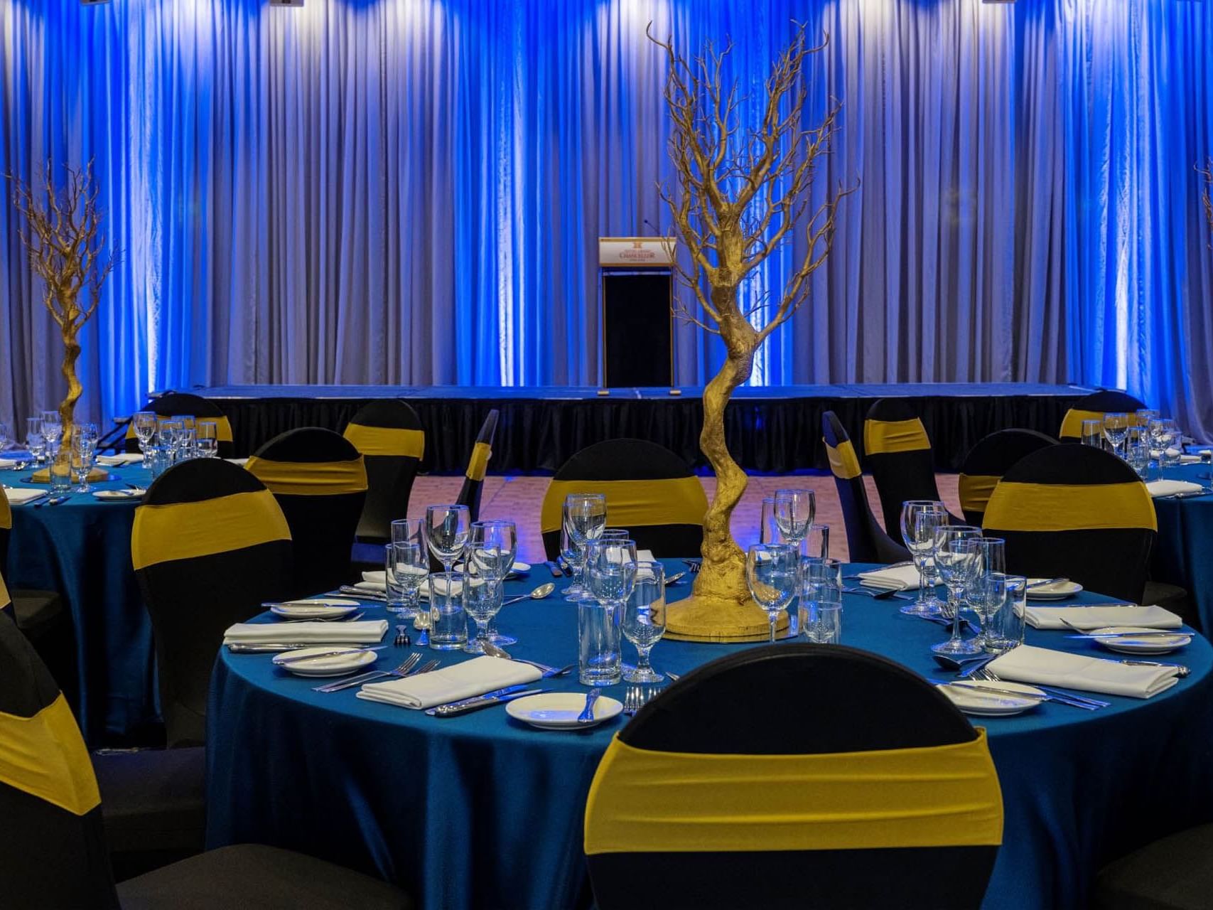 Banquet set-up in illuminated Hindley Ballroom at Grand Chancellor Adelaide