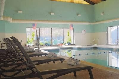 Lounge Chairs Next To Indoor Pool