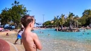 A boy enjoying the view of the Settlement Cove Lagoon near The Sebel Brisbane Margate Beach