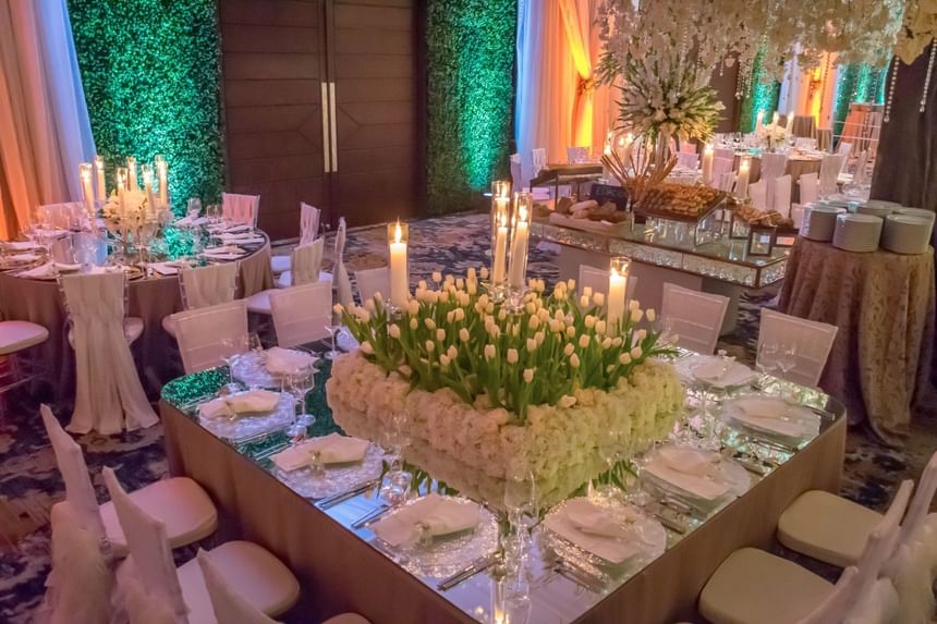 Banquet table decorated with flowers at Tikal Futura Hotel