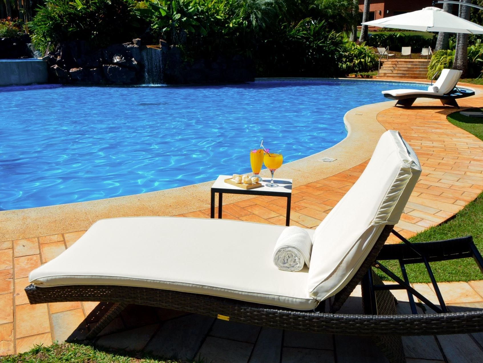 A Sunbed by the pool in Pool Bar at Iguazu Grand Resort