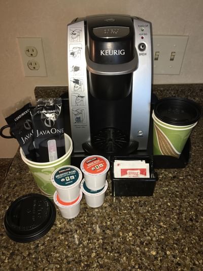 Close-up of coffee maker with ingredients at Boothill Inn & Suites