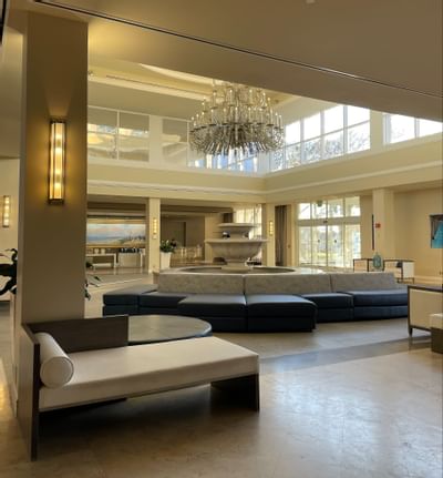 A view of looby with blue couches at Ocean Place Resort & Spa