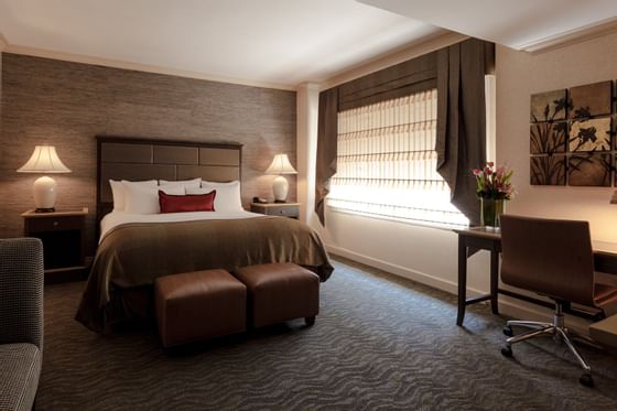Work desk & bed in Superior king at The Whitehall Hotel