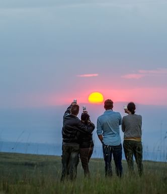 Tourists at Sundowners on The Crater Rim near Ngorongoro Serena