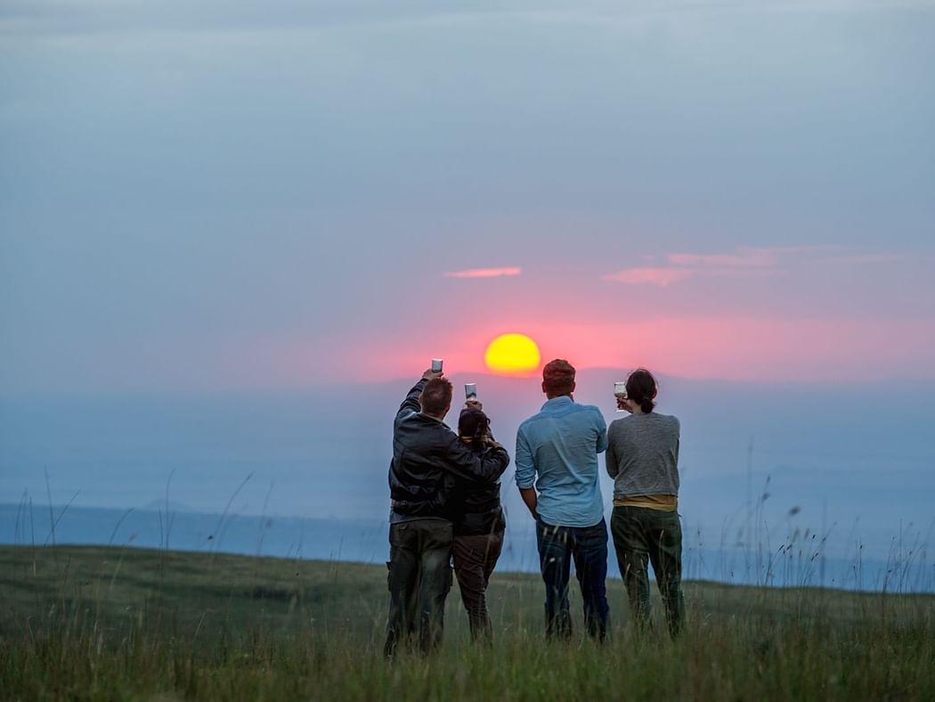 Tourists at Sundowners on The Crater Rim near Ngorongoro Serena