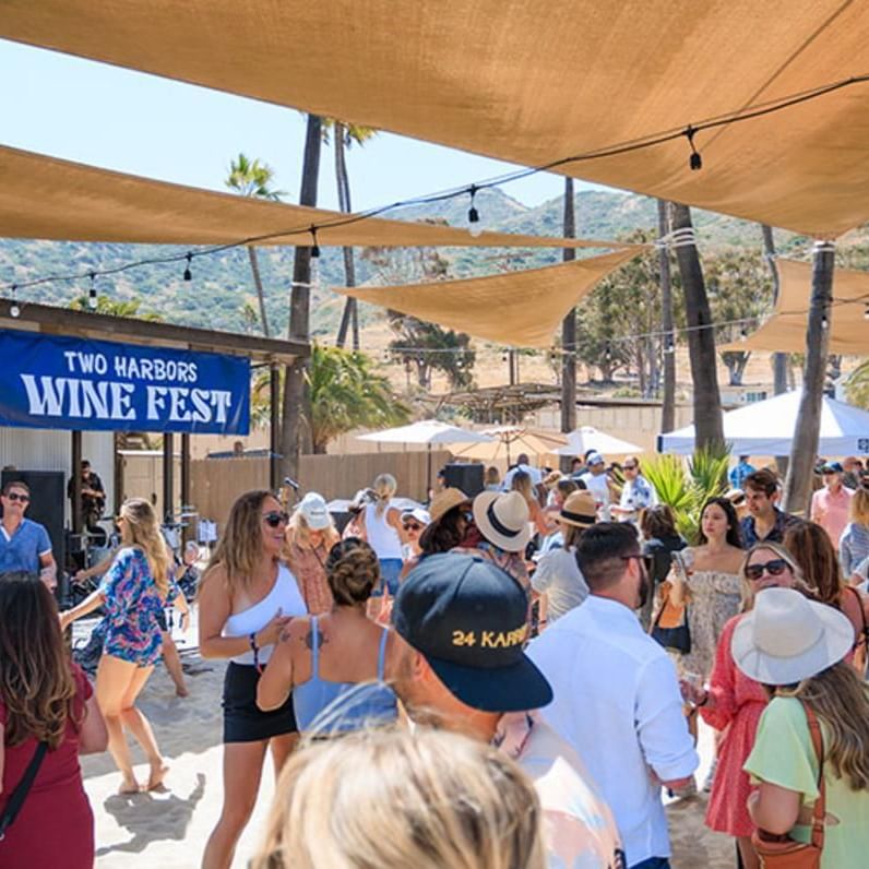 People enjoying Two Harbors Wine Fest at Catalina Island Company