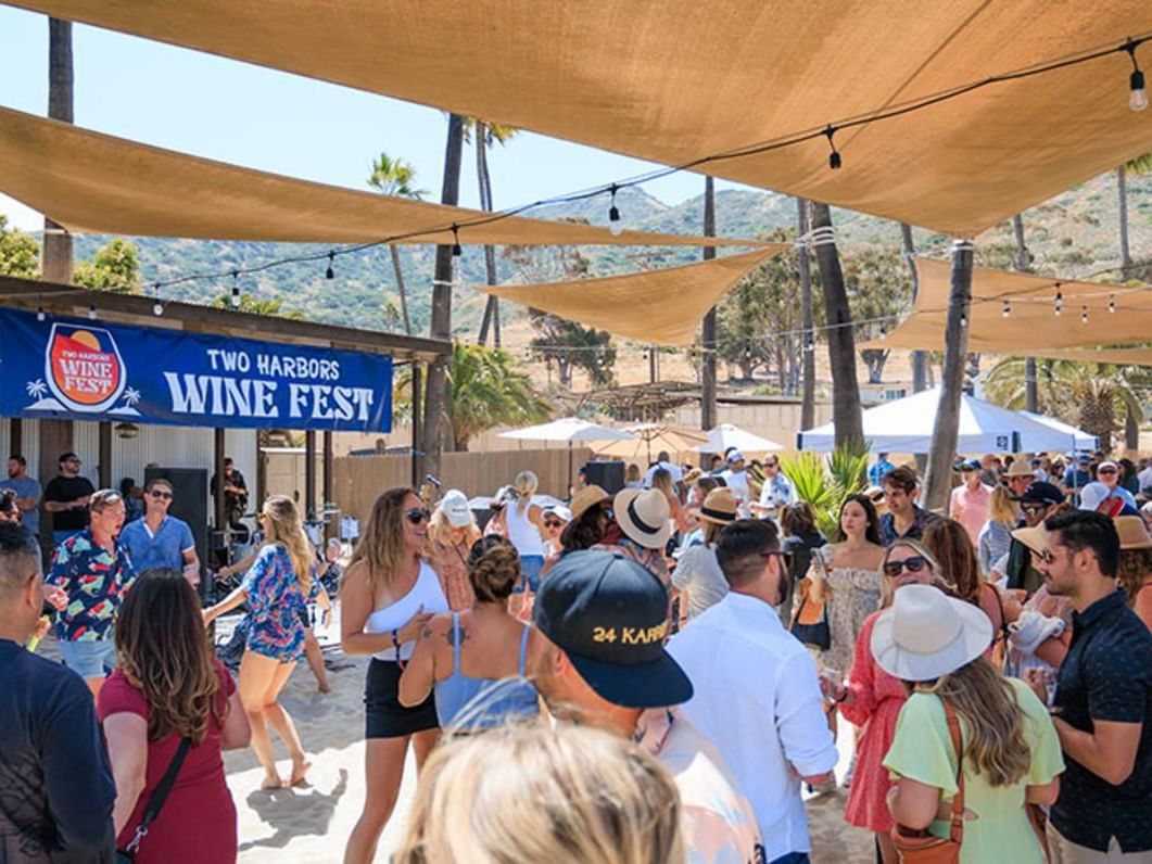 People enjoying Two Harbors Wine Fest at Catalina Island Company