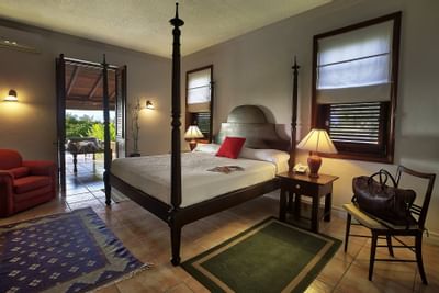 King-size canopy bed inside a villa