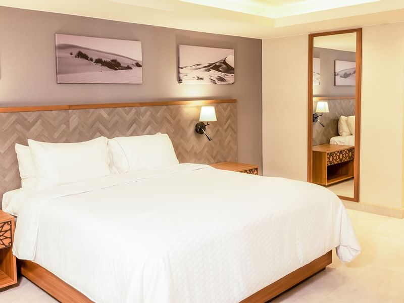 Bed in Executive suite at Fiesta Americana Travelty