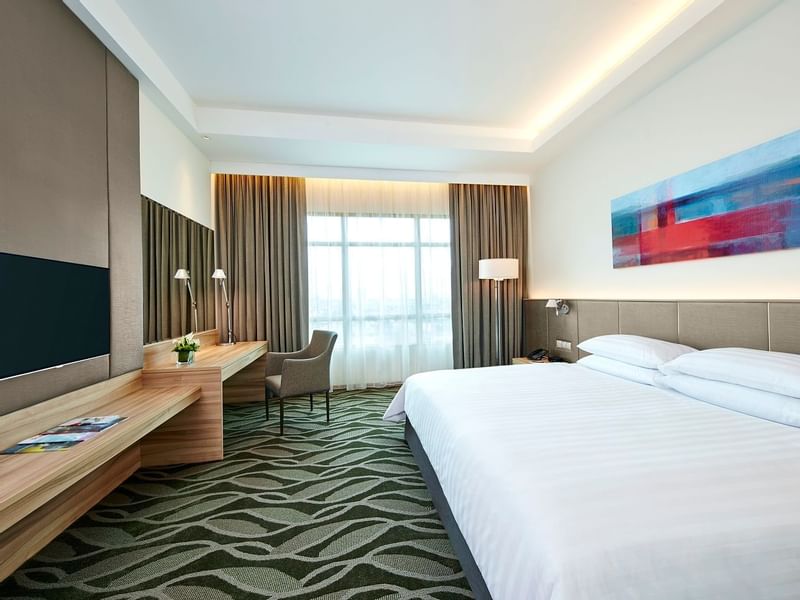TV & lounge in Presidential Suite Bed Room at Sunway Hotel Phnom Penh