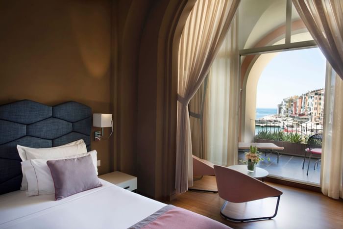 Bed by the window-Hotel Portovenere  