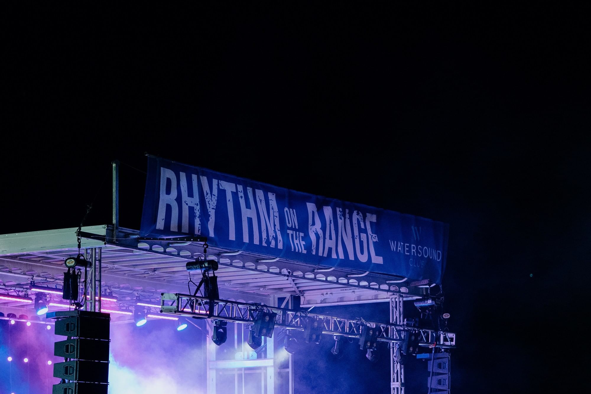 A stage with a banner reading 